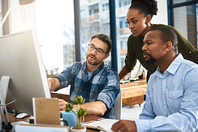 Property management team looking at fire safety data insights