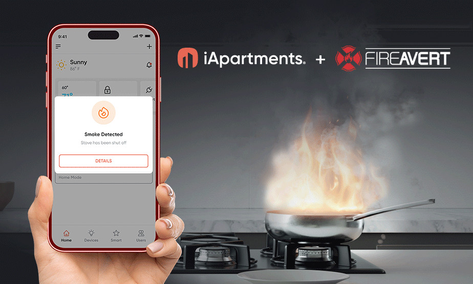 Hand holding app that says smoke detected, stove has been shut off